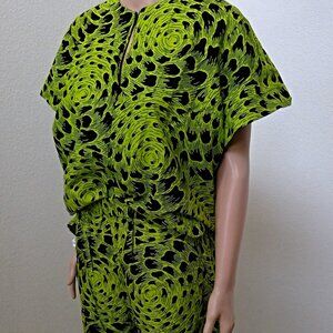 Hey, check out this cute green and black African print top and shorts set!